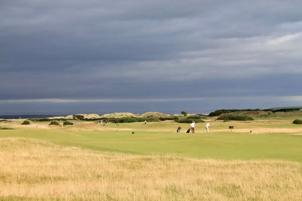 Golfers playing at St. Andrews