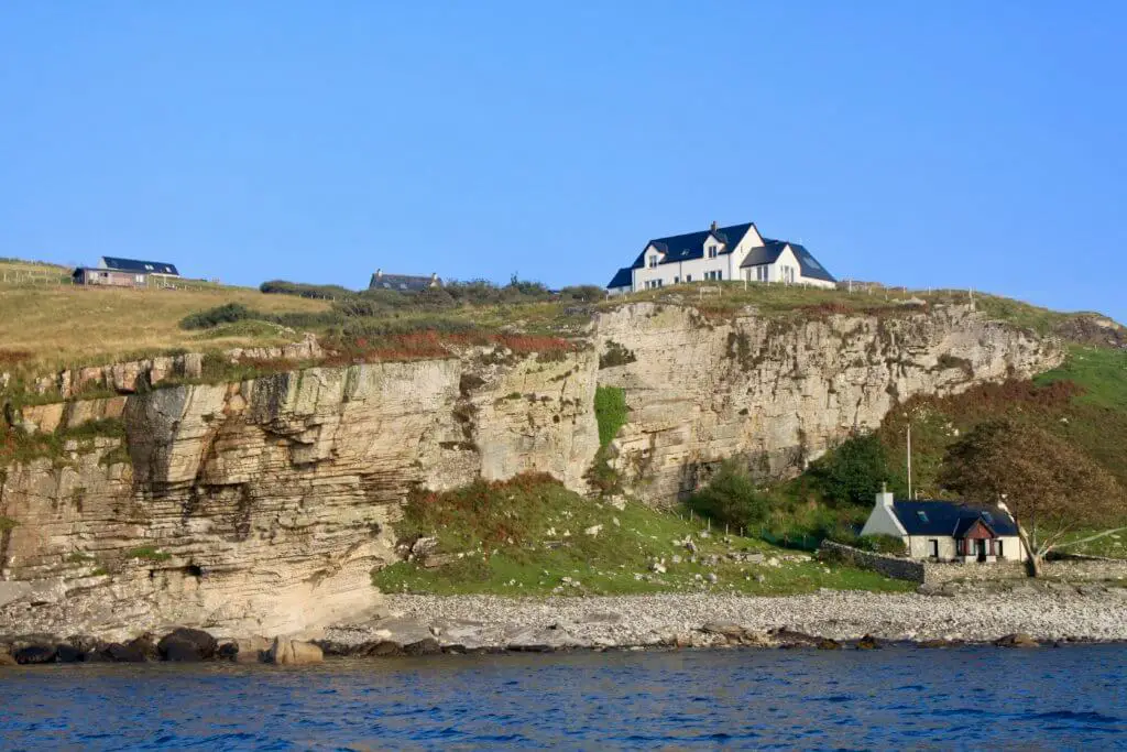 Cottages perched on cliffs near Elgol, Skye