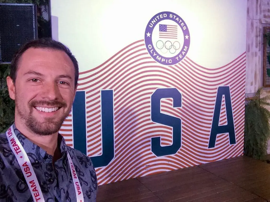 Max in front of a Team USA sign