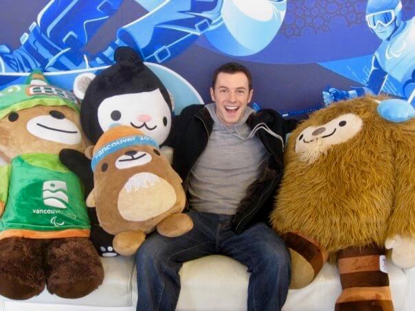 Max with stuffed Olympic mascots
