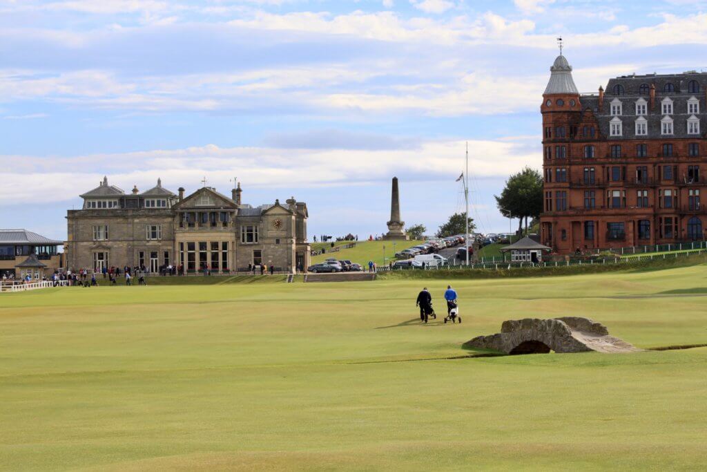 Golfers on 18th hole with Swilcan Bridge in foreground. St. Andrews was one of my in-laws' favorite stops on our week in Scotland itinerary.