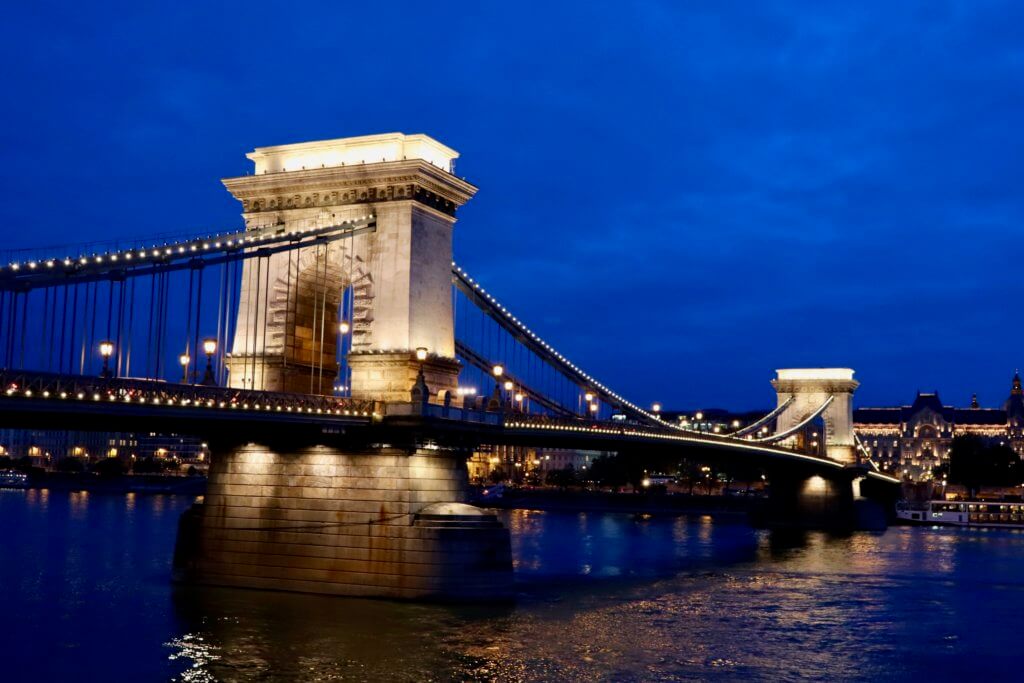 Chain Bridge lit up at dusk