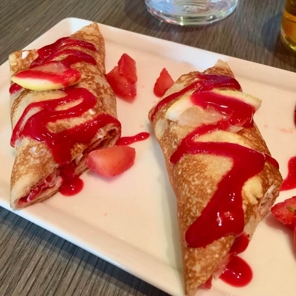Lemon ricotta crepes with berries