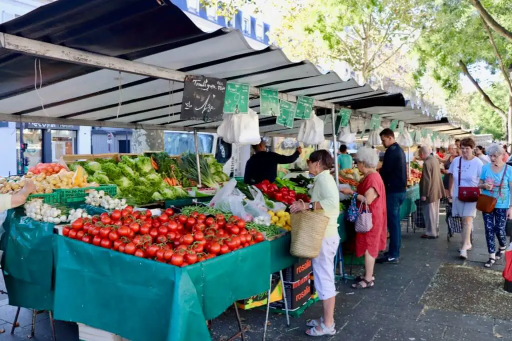 Produce vendor at the Marche Bastille outdoor market