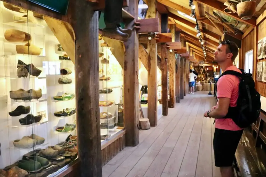 M looking at the wooden shoes in the museum in Zaanse Schans