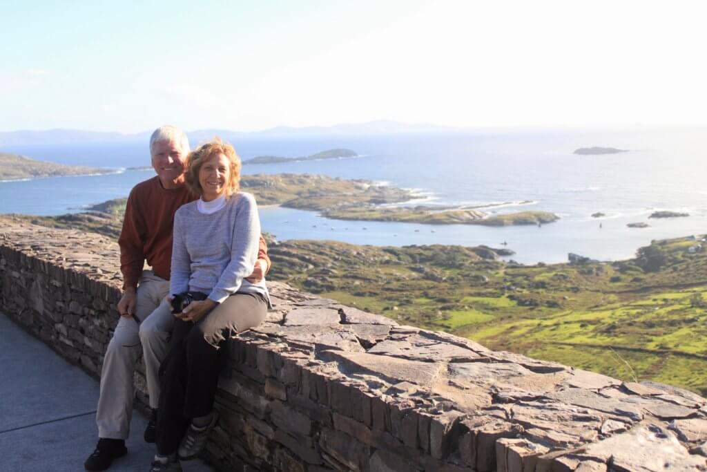 M's parents in front of a beautiful overlook
