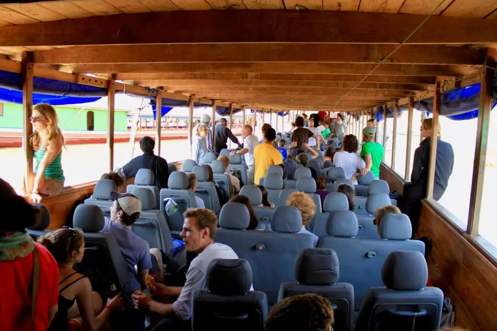 Interior of the longboat filled with people