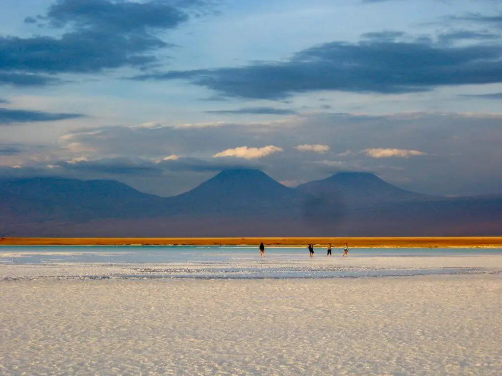 People in the distance on the salt flats of the Salar de Atacama