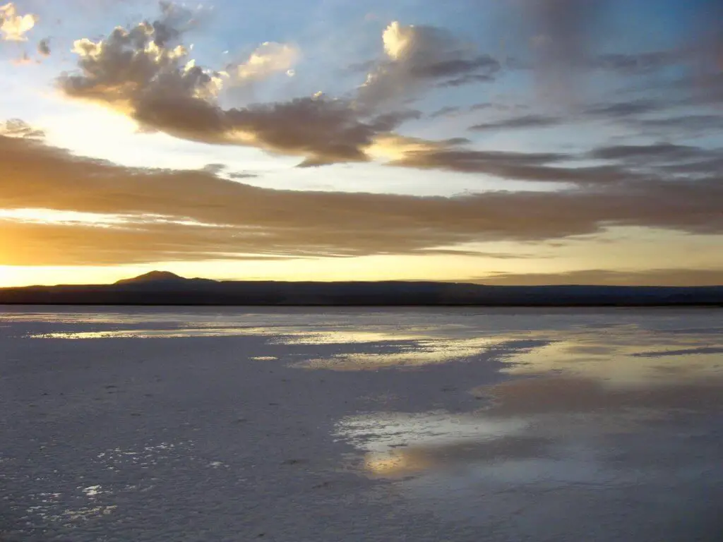 Sunset on the Salar de Atacama, with light reflecting off water