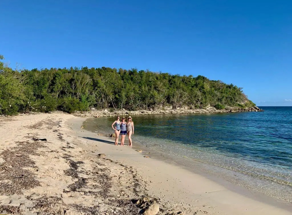 Gwen, Mom, and Brooke on the deserted beach where snorkeling took place