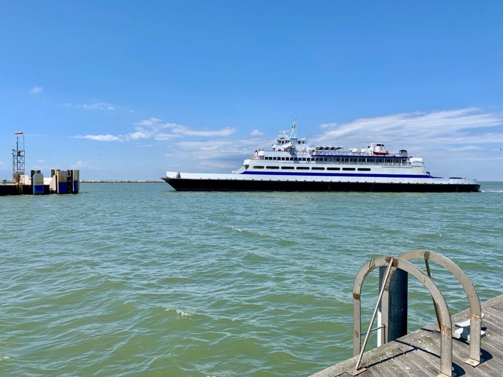 The Cape May-Lewes Ferry returning to dock in Lewes - a great day trip from Rehoboth Beach