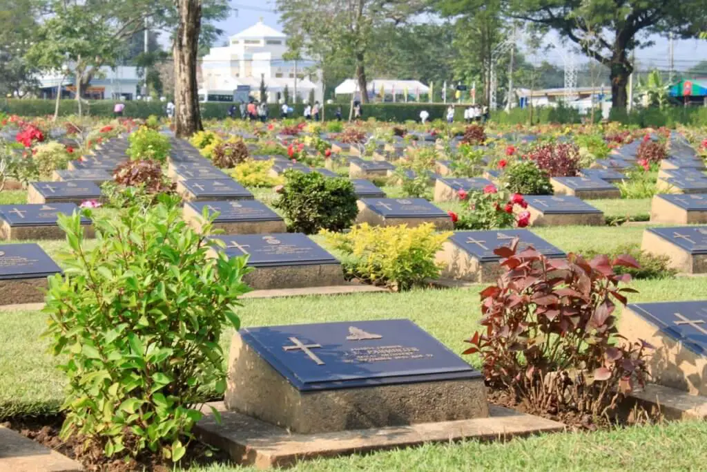 When visiting the Bridge on the River Kwai, it's good to stop and pay your respects at the nearby Kanchanaburi War Cemetery where its laborers are interred.