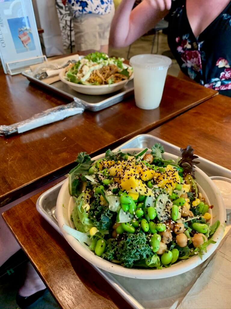 Stuffed avocado bowl with edamame, sesame seeds, and mango