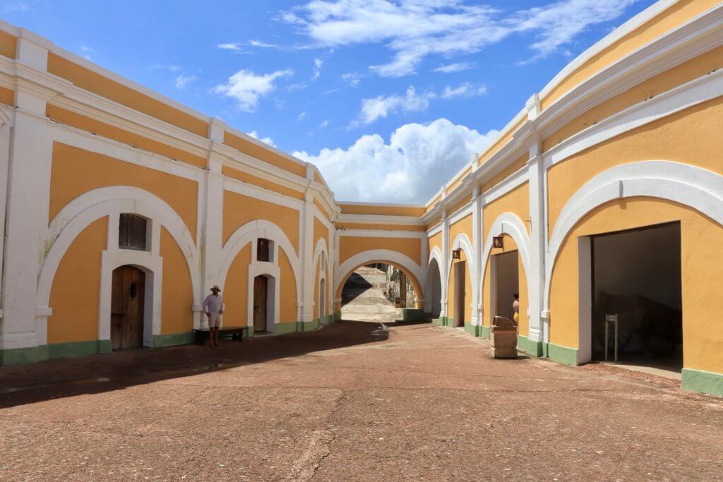 Yellow Plaza de Armas with bright blue sky