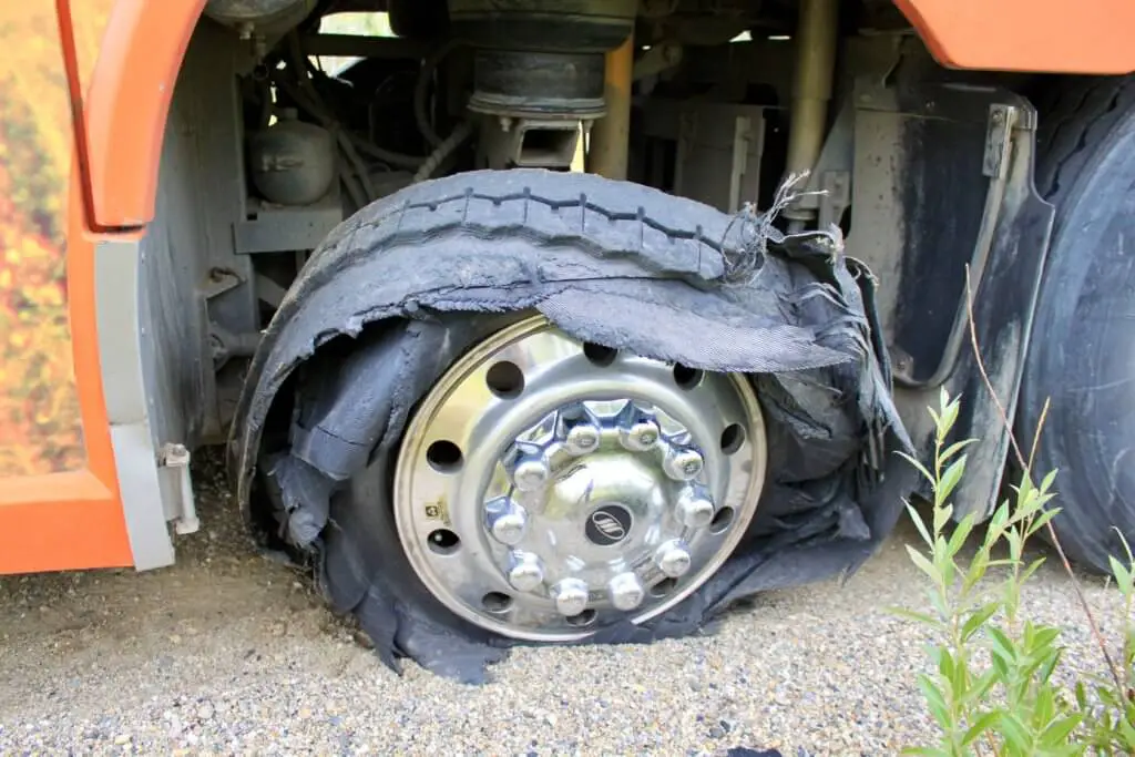 Shredded tire on a motorcoach