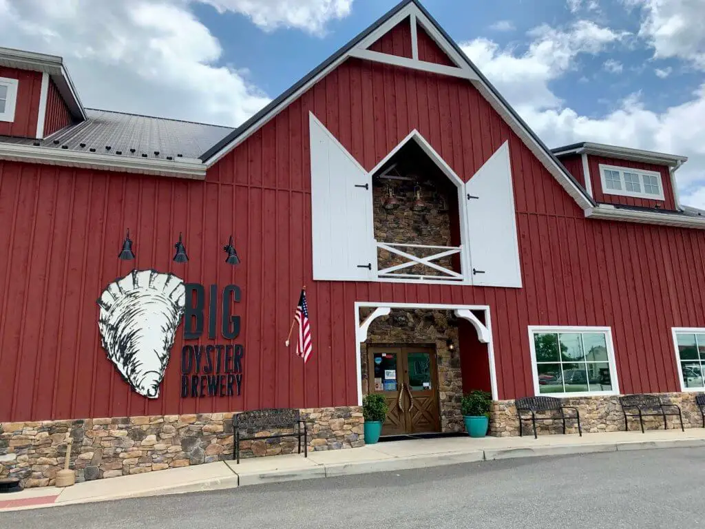 Barn-like exterior of Big Oyster Brewery