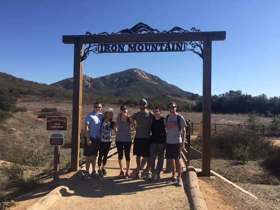 Group photo under the Iron Mountain sign