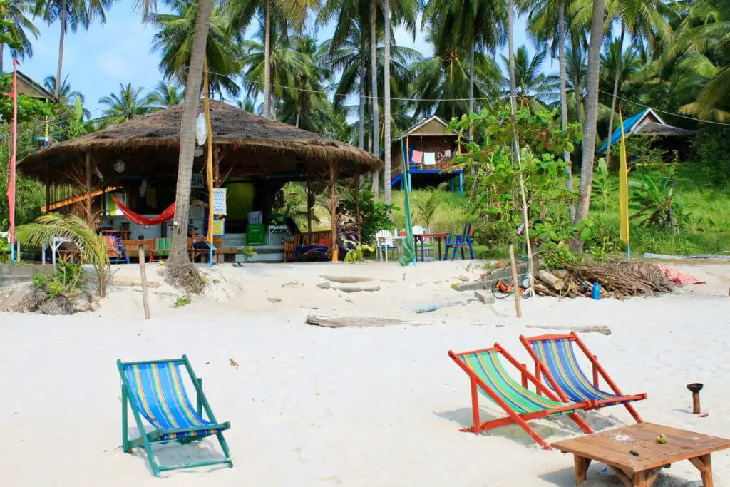 Thailand beach bar with chairs in the sand