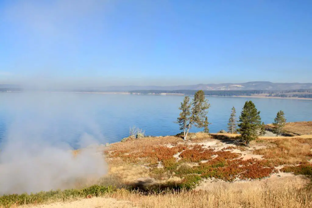 Yellowstone Lake with steam vent in foreground