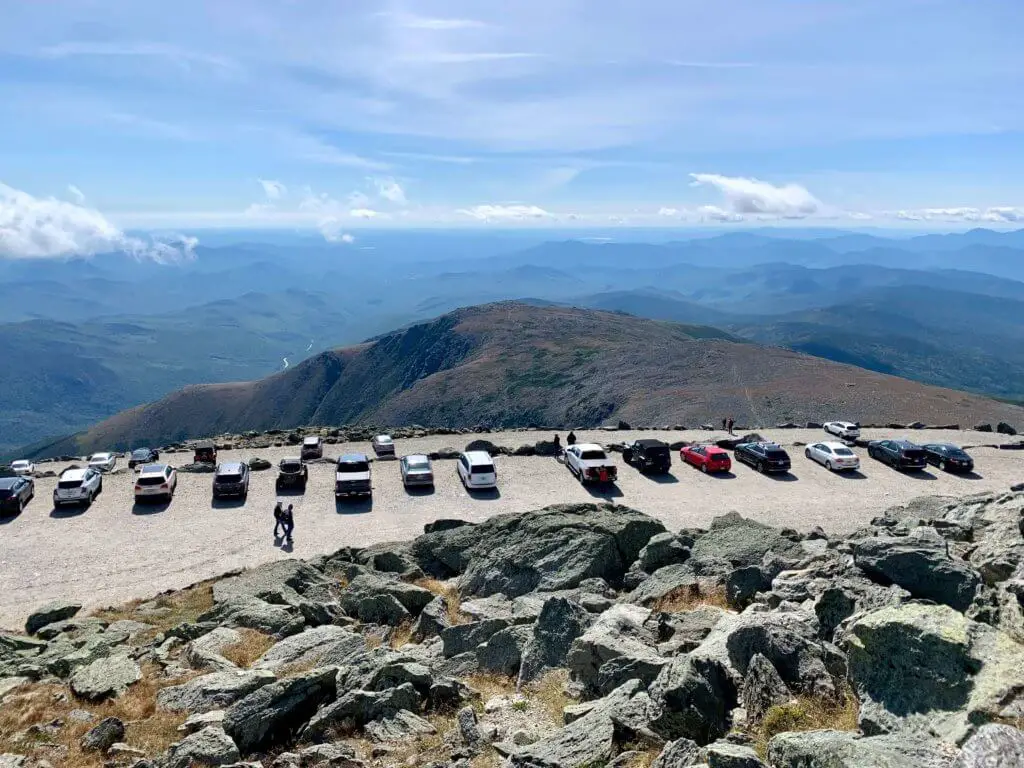 Large parking lot overlooking more mountains facing East