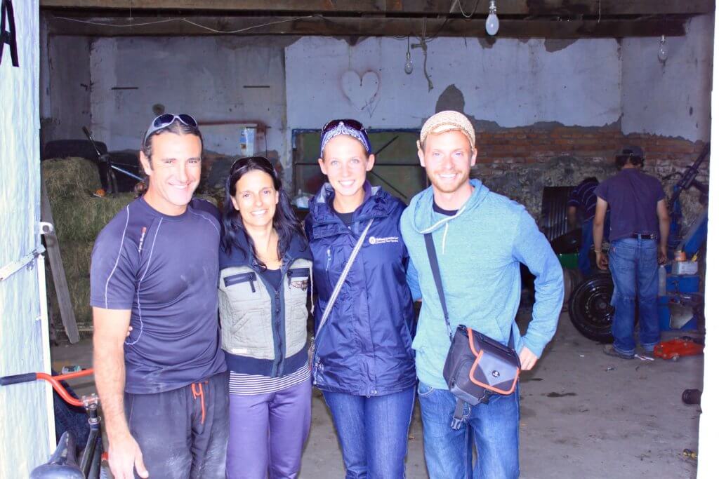 Gustavo, Bettina, Gwen, and Kyle at the tire shop