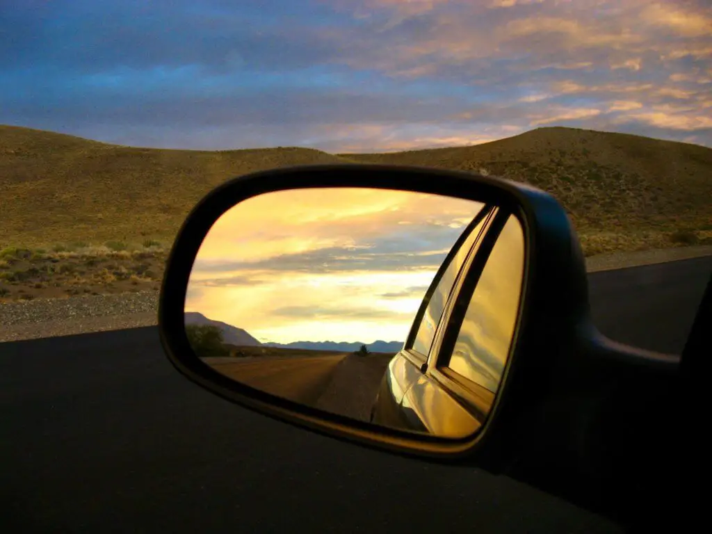 Sunset reflected in a side mirror driving along Argentina's Ruta 40