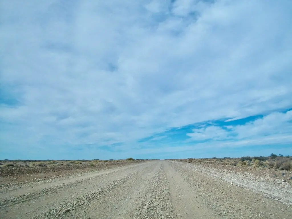 Barren stretch of Argentina's Ruta 40 with big blue sky overhead