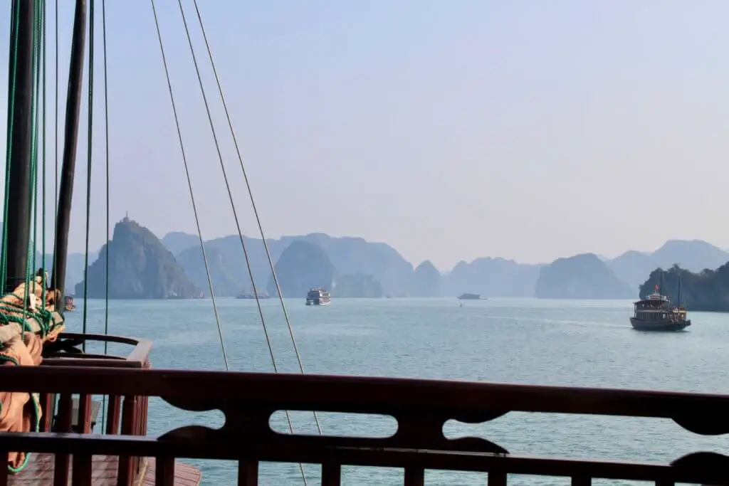 Ships and islands in Ha Long Bay from the deck of a cruise
