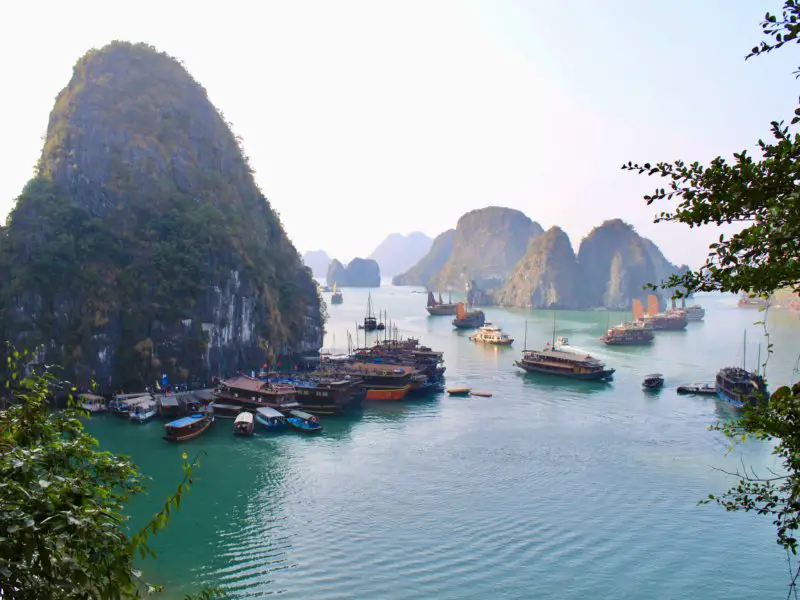 View of boats, islands, and water in Ha Long Bay