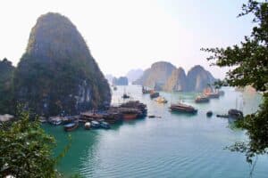 View of boats, islands, and water in Ha Long Bay