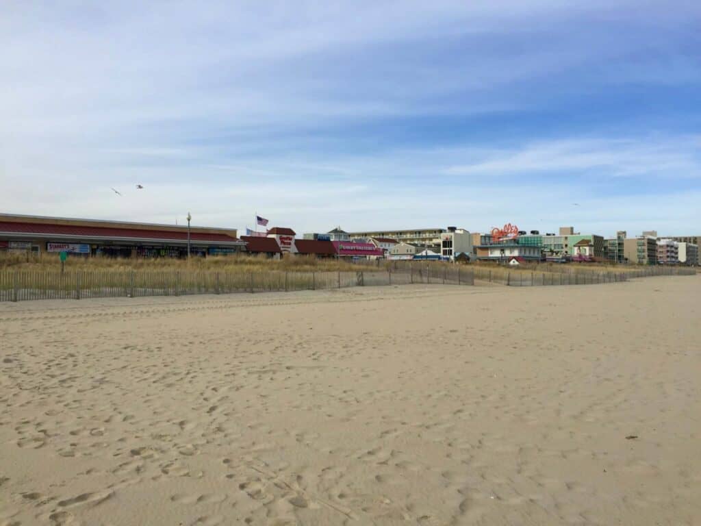 Empty sand in front of the Rehoboth Beach boardwalk during the off-season