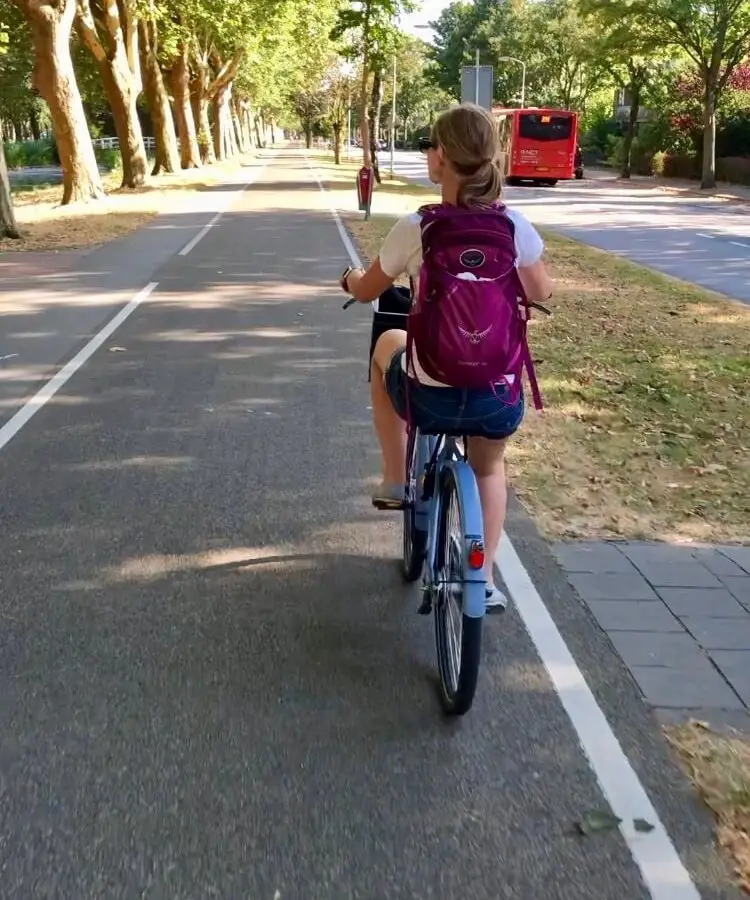 Gwen biking on bike path